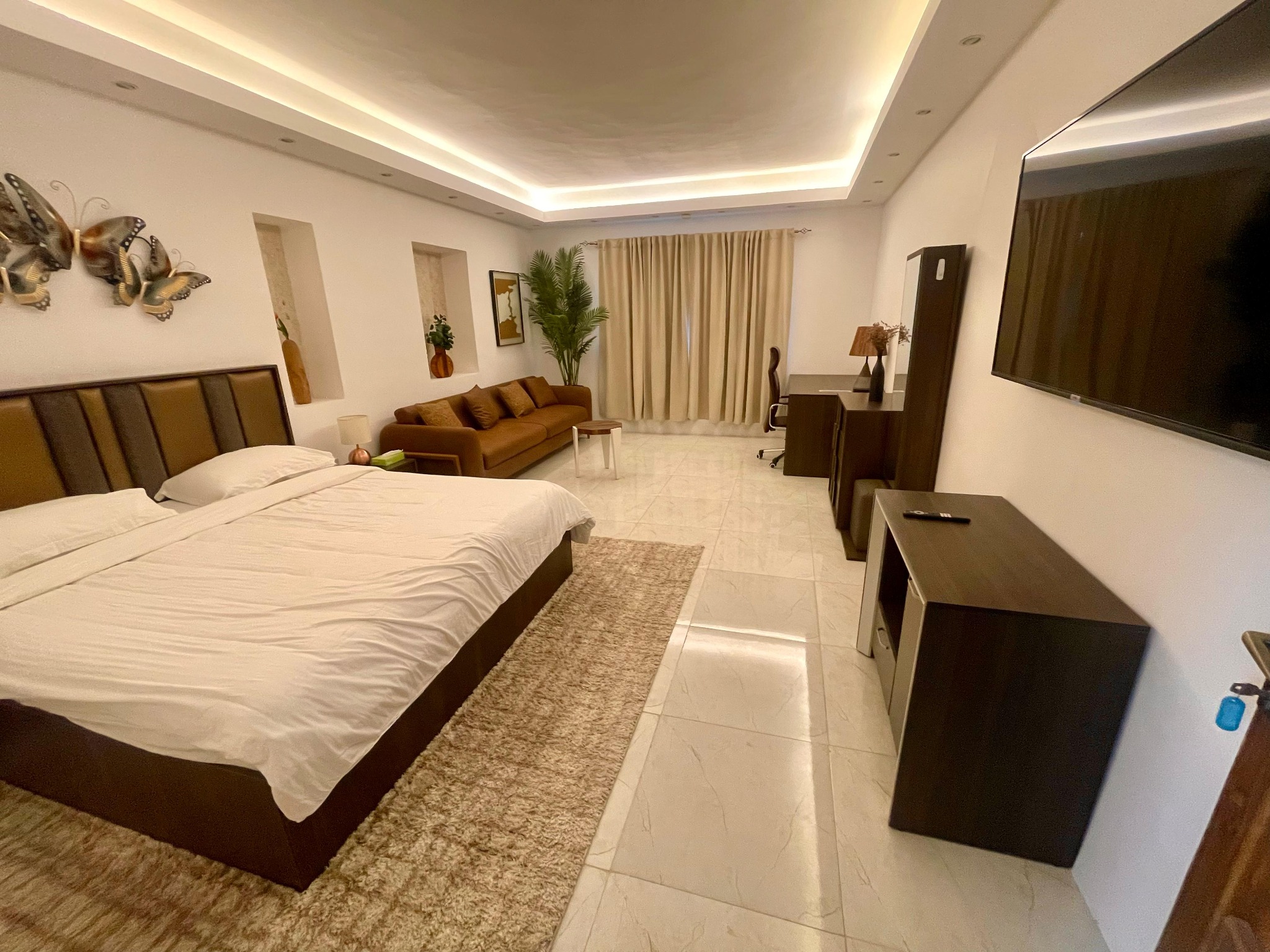 Bedroom with lounge and work area